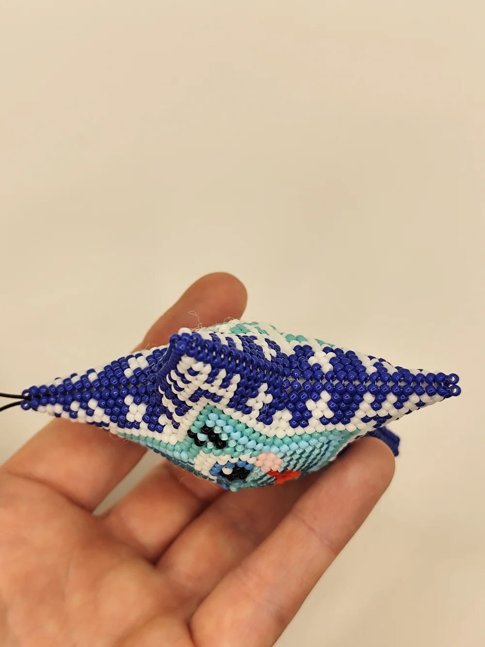 Handmade Blue Star Beaded Holiday Ornament - Smiling Face